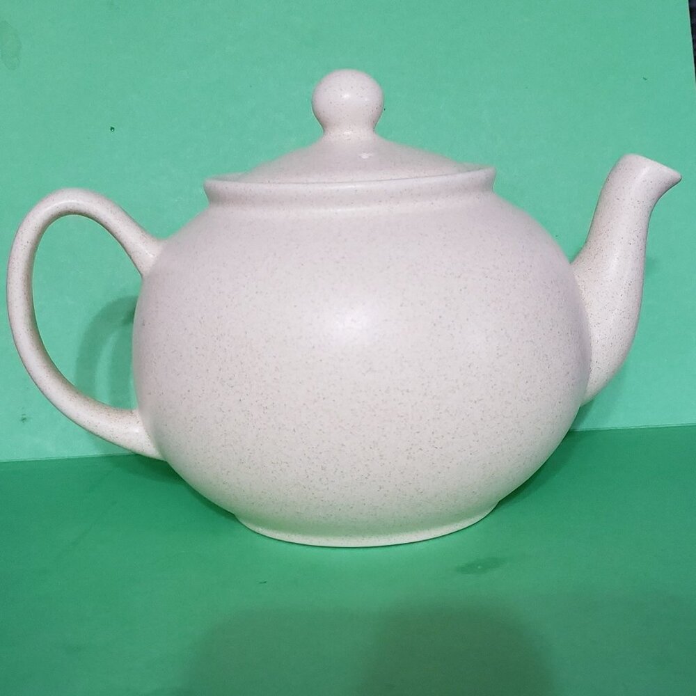 Elegant Cream Teapot